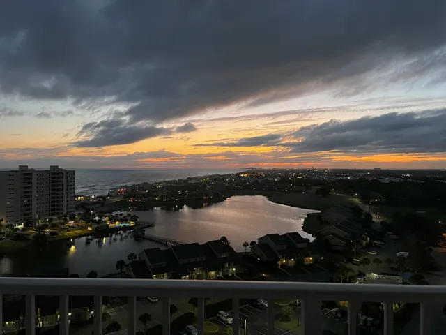 a view of a lake with a city