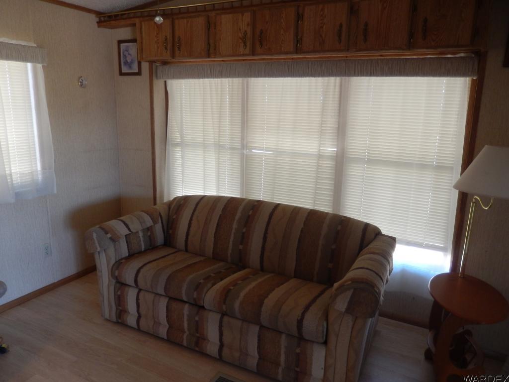 68202 Simcox Road Salome, AZ 85348 - Photo 3 of 7 a living room with furniture and a window