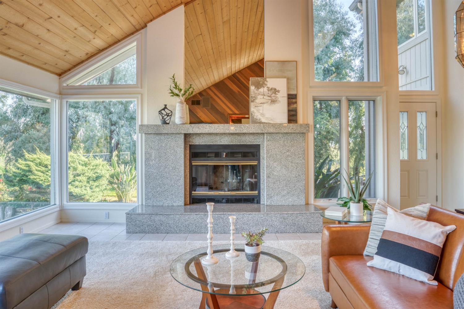 4578 Millerton Road Friant, CA 93626 - Photo 12 of 97 a living room with furniture and a floor to ceiling window