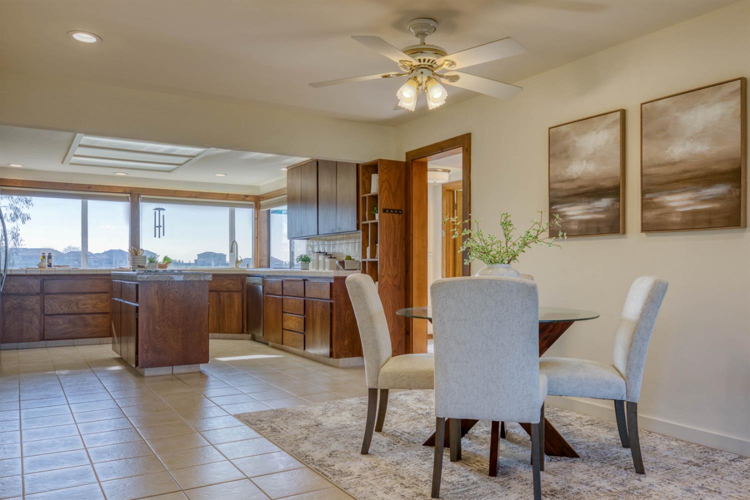 4578 Millerton Road Friant, CA 93626 - Photo 13 of 97 a view of a dining room with furniture window and wooden floor