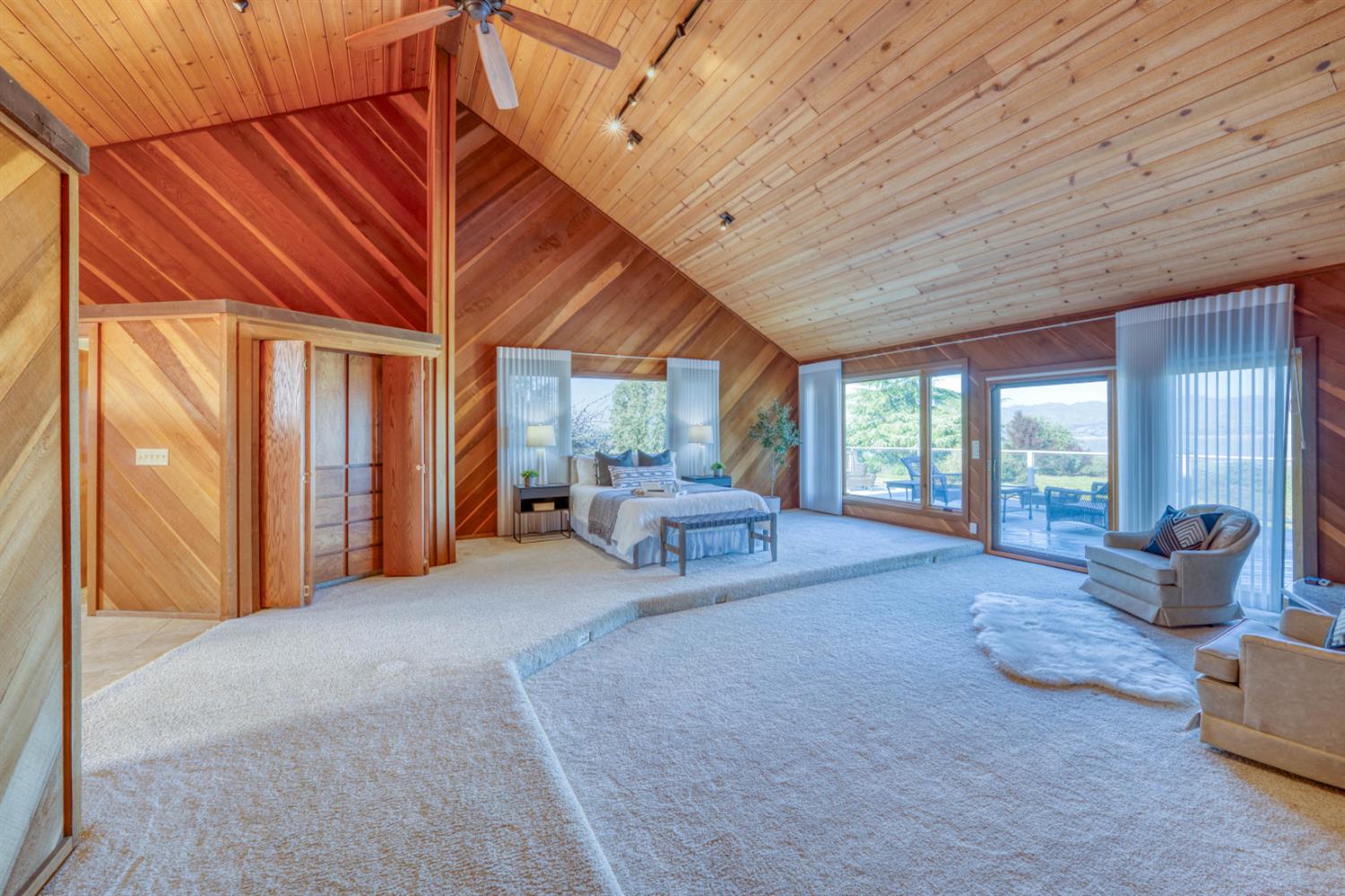 4578 Millerton Road Friant, CA 93626 - Photo 31 of 97 a bedroom with furniture and large window