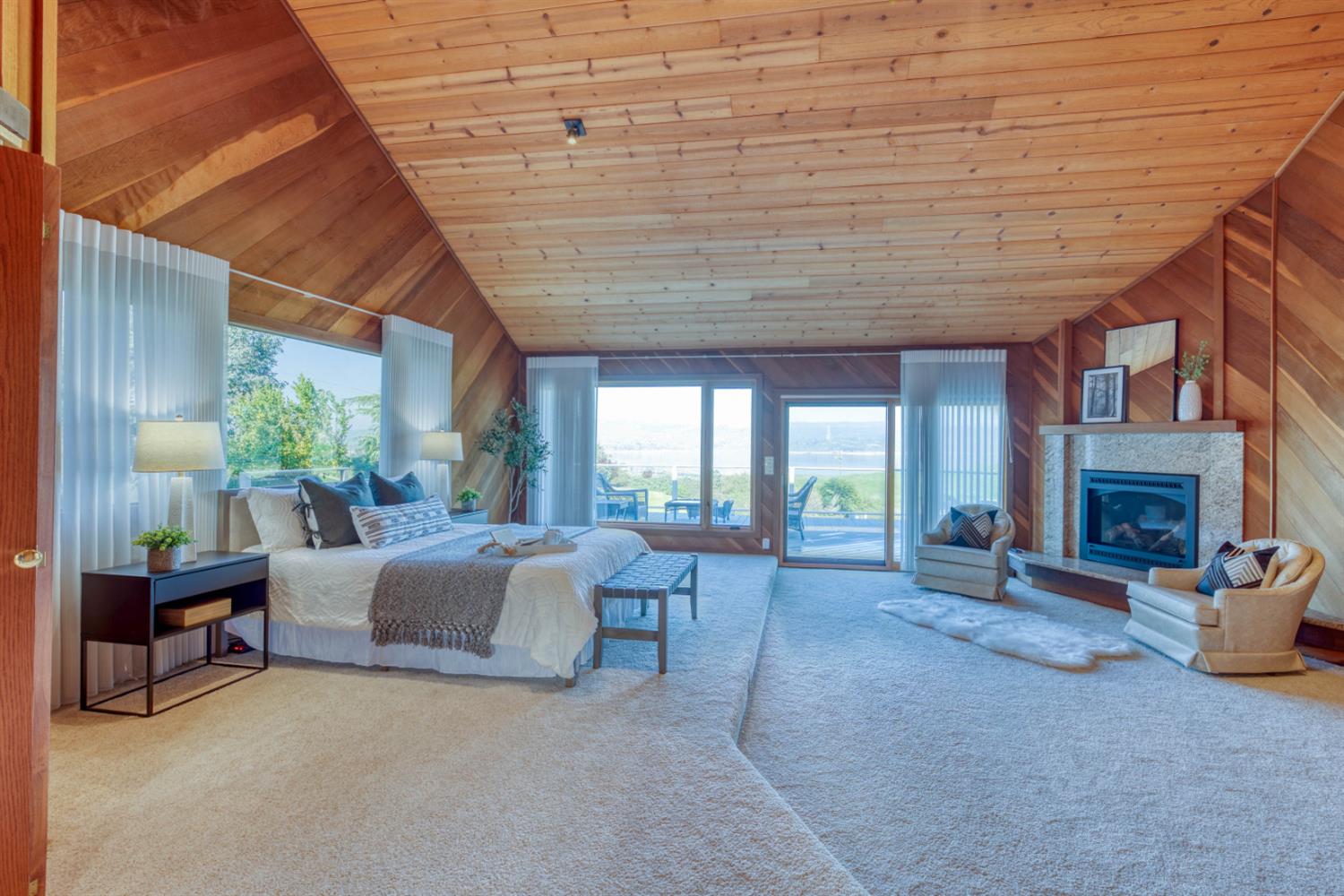 4578 Millerton Road Friant, CA 93626 - Photo 32 of 97 a living room with furniture and a fireplace