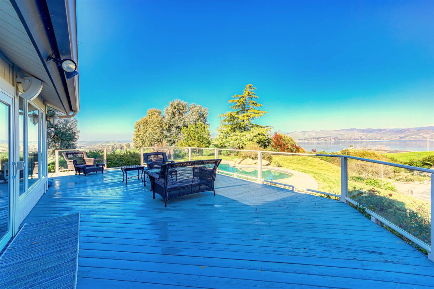 4578 Millerton Road Friant, CA 93626 - Photo 56 of 97 a view of a swimming pool with an ocean from a living room