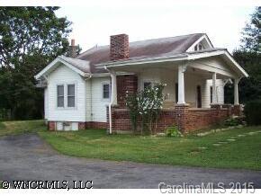 690 North Canton Road Canton, NC 28716 - Photo 1 of 2 a front view of a house with a yard