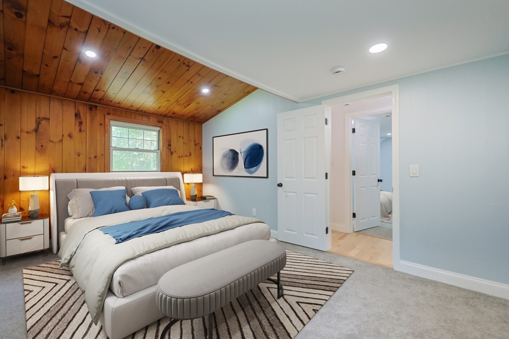 25 Bailey Road Townsend, MA 01474 - Photo 21 of 29 a bedroom with furniture and a wooden floor