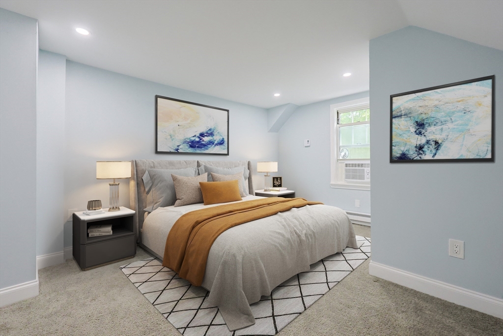 25 Bailey Road Townsend, MA 01474 - Photo 23 of 29 a spacious bedroom with a bed and a painting on the wall