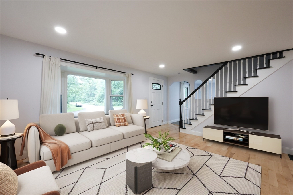 25 Bailey Road Townsend, MA 01474 - Photo 8 of 29 a living room with furniture and a flat screen tv