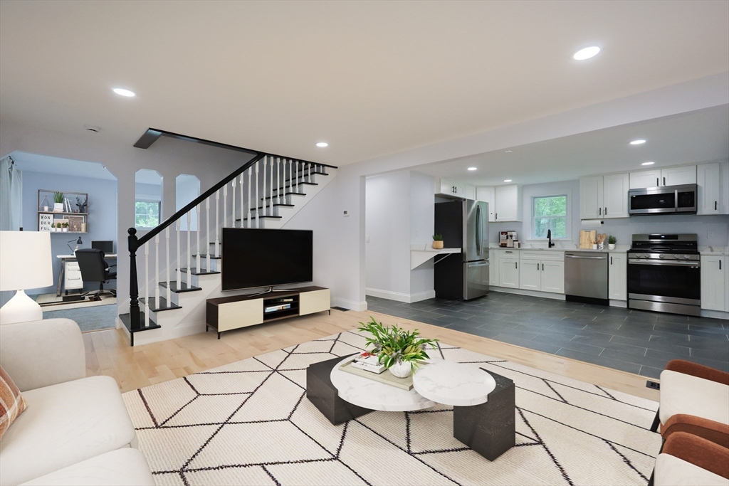 25 Bailey Road Townsend, MA 01474 - Photo 9 of 29 a living room with furniture and a flat screen tv
