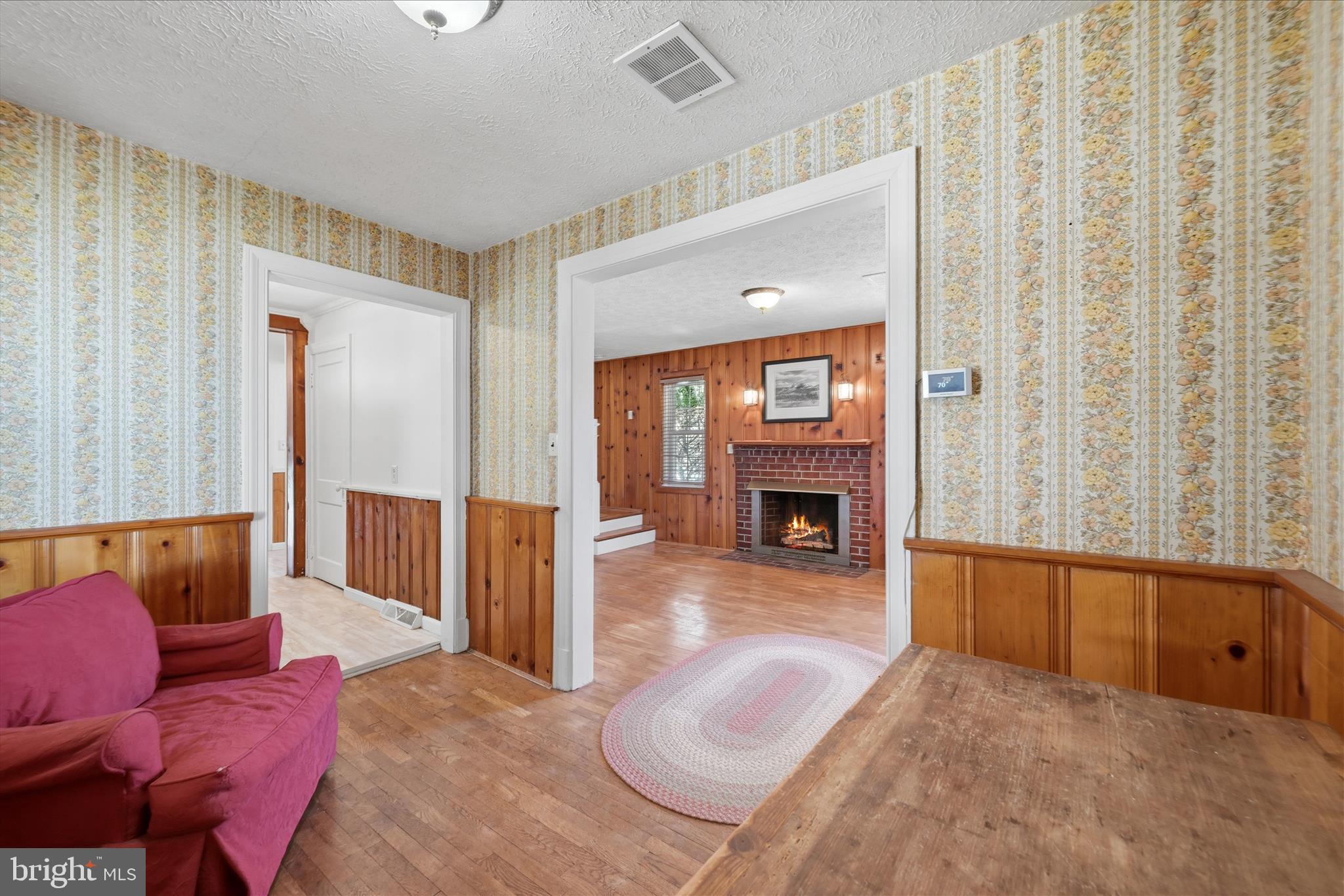 510 North Pleasant Valley Road Winchester, VA 22601 - Photo 15 of 63 a bedroom with furniture and a fireplace