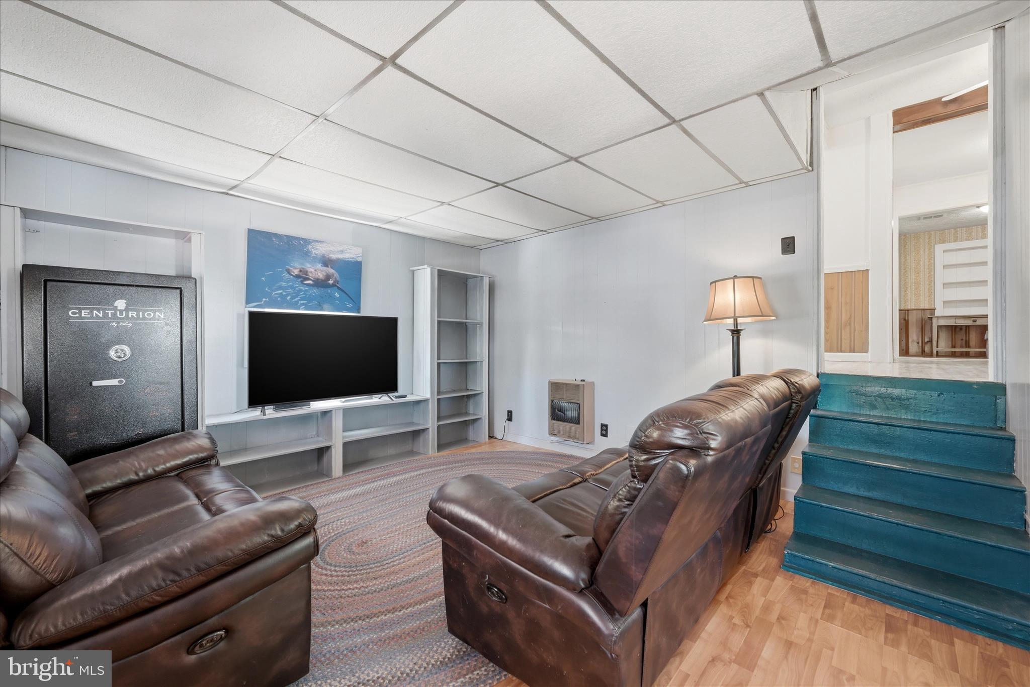 510 North Pleasant Valley Road Winchester, VA 22601 - Photo 28 of 63 a living room with furniture and a flat screen tv