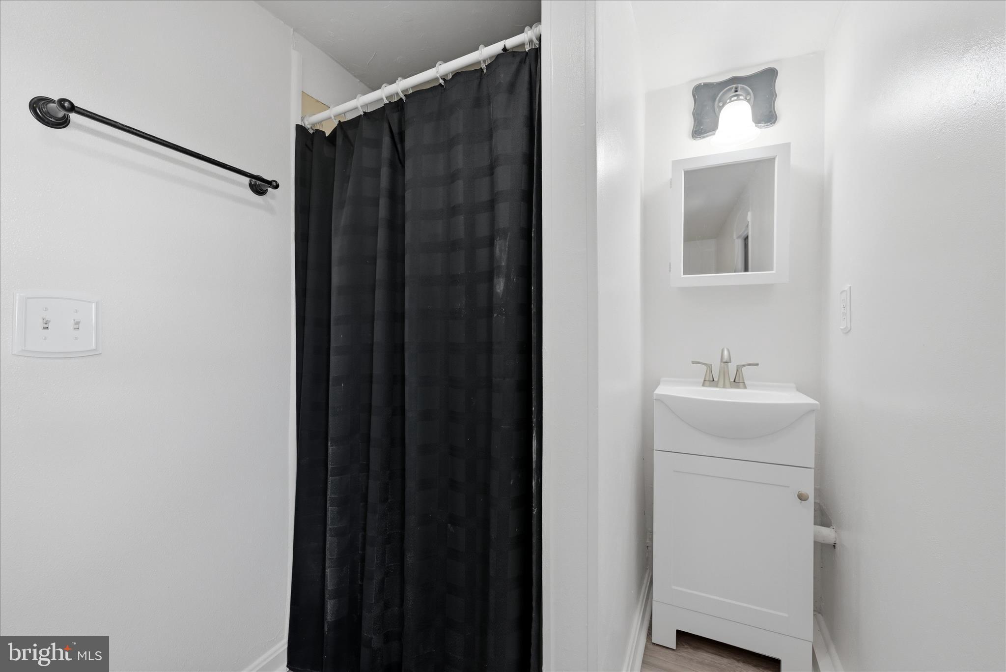 510 North Pleasant Valley Road Winchester, VA 22601 - Photo 30 of 63 a bathroom with a sink and mirror