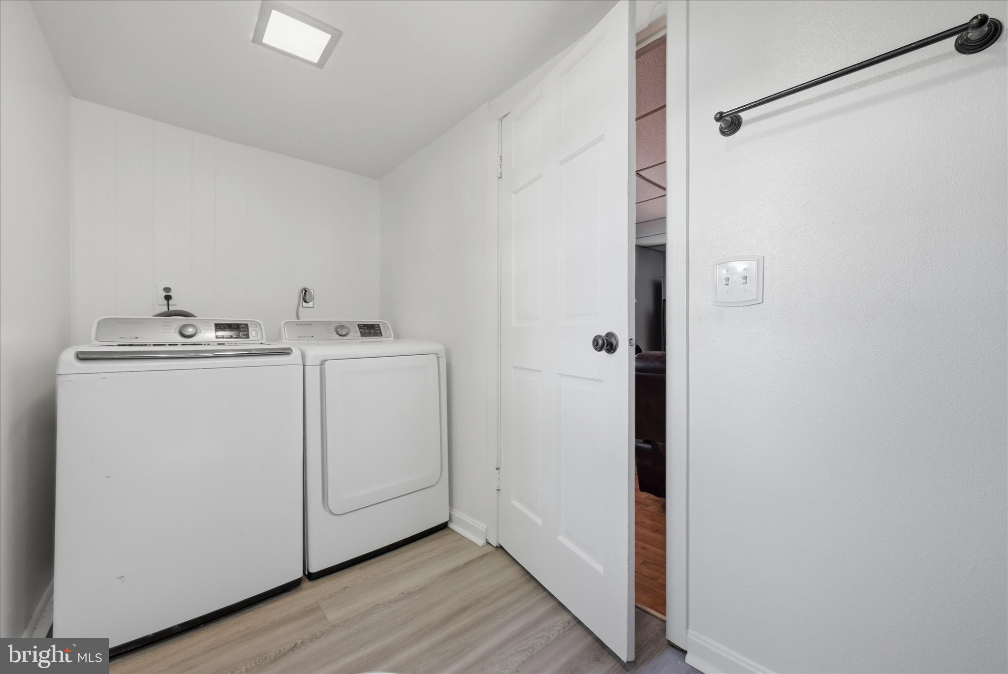 510 North Pleasant Valley Road Winchester, VA 22601 - Photo 31 of 63 a utility room with cabinets washer and dryer