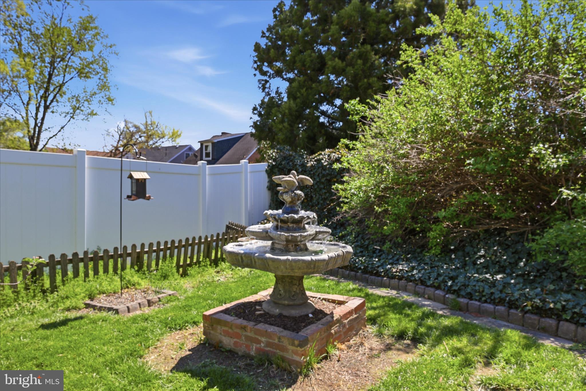 510 North Pleasant Valley Road Winchester, VA 22601 - Photo 48 of 63 a view of a garden with a fountain