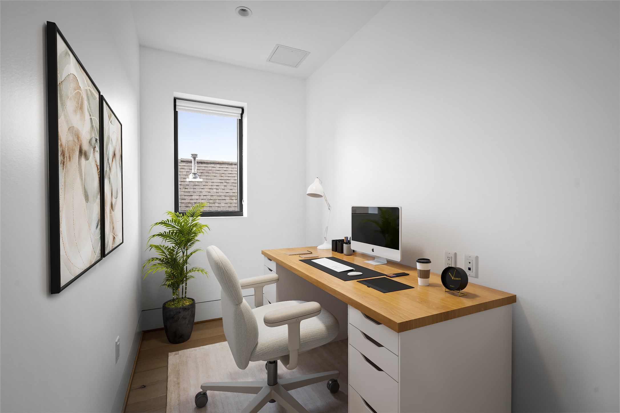 2406 Tangley Street, Unit 200 Houston, TX 77005 - Photo 18 of 20 a view of a workspace with furniture and a potted plant