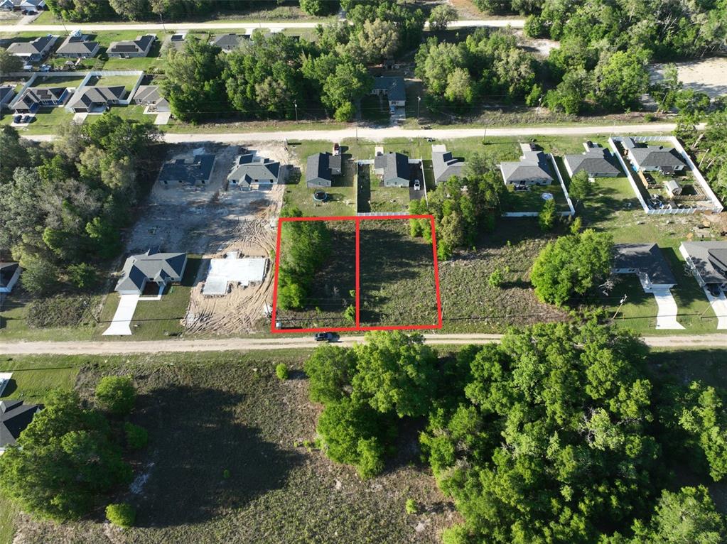 Southwest 112th Street Dunnellon, FL 34432 - Photo 4 of 6 a view of swimming pool with lawn chairs and plants