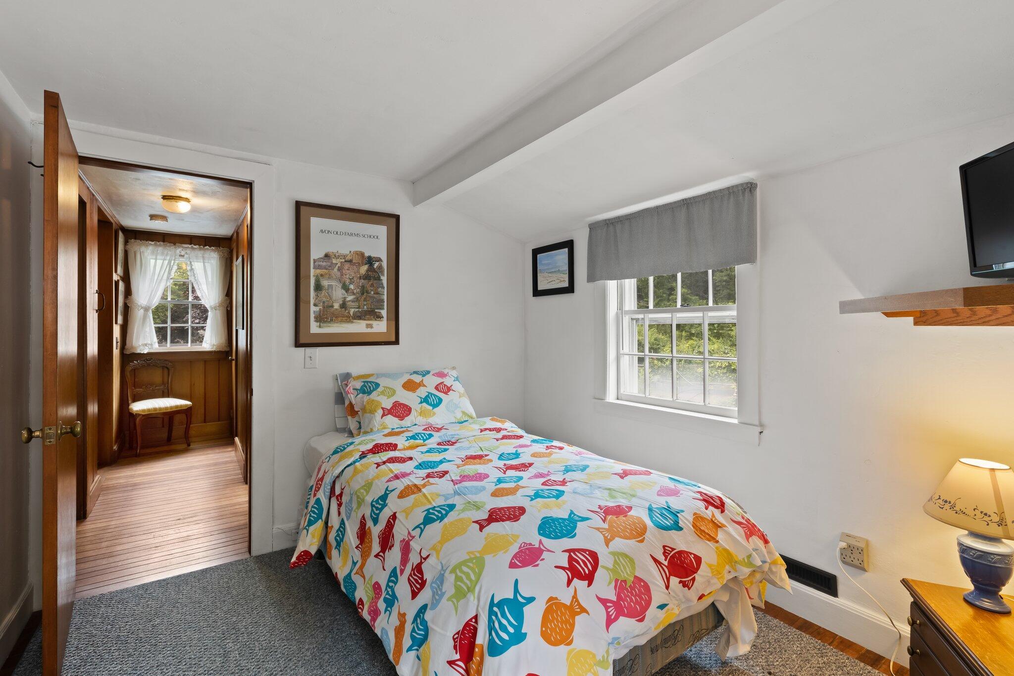 152 Monument Road Orleans, MA 02653 - Photo 31 of 40 a bedroom with a bed and a window