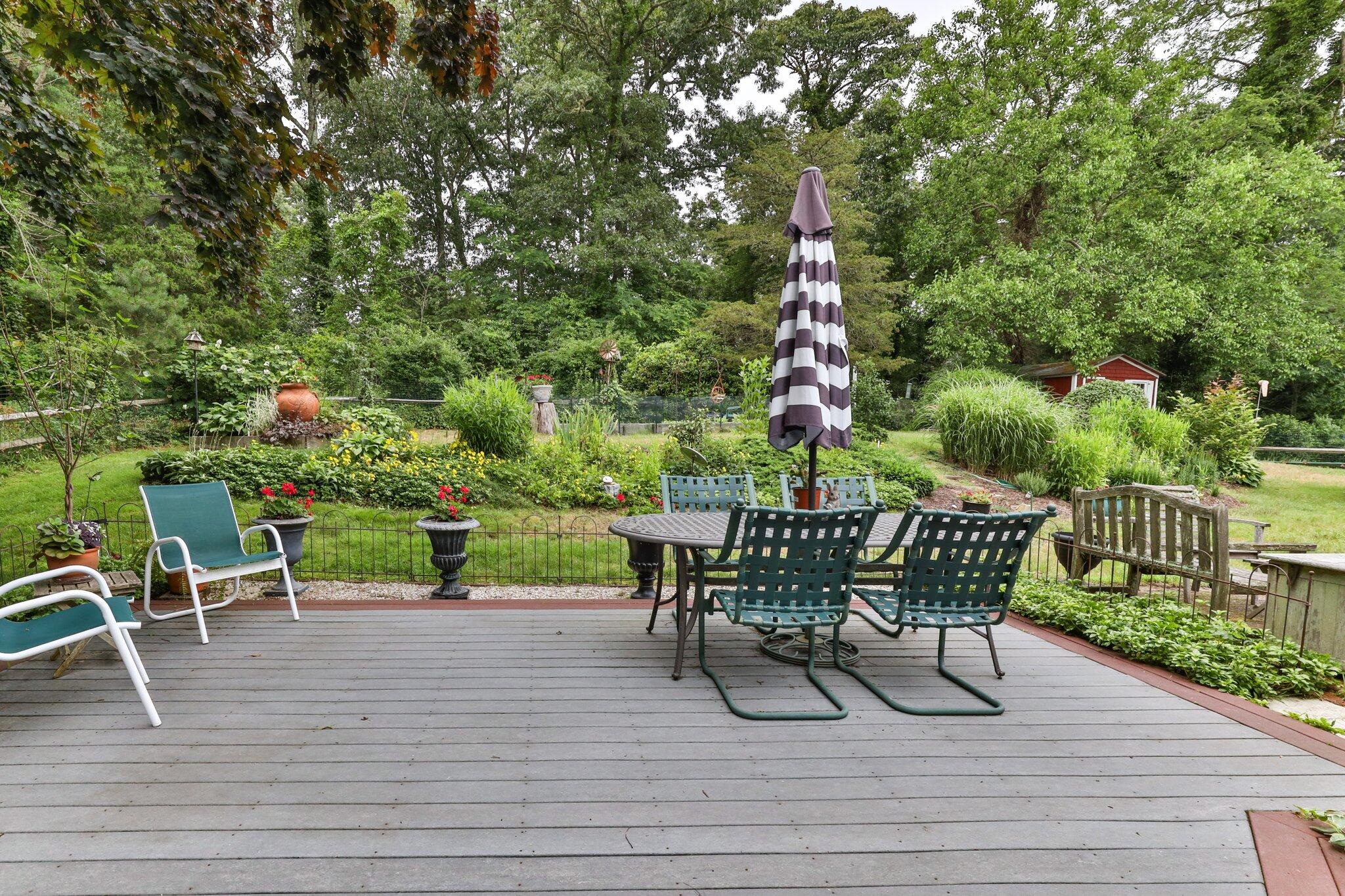 152 Monument Road Orleans, MA 02653 - Photo 35 of 40 a view of a chairs and table on the wooden floor