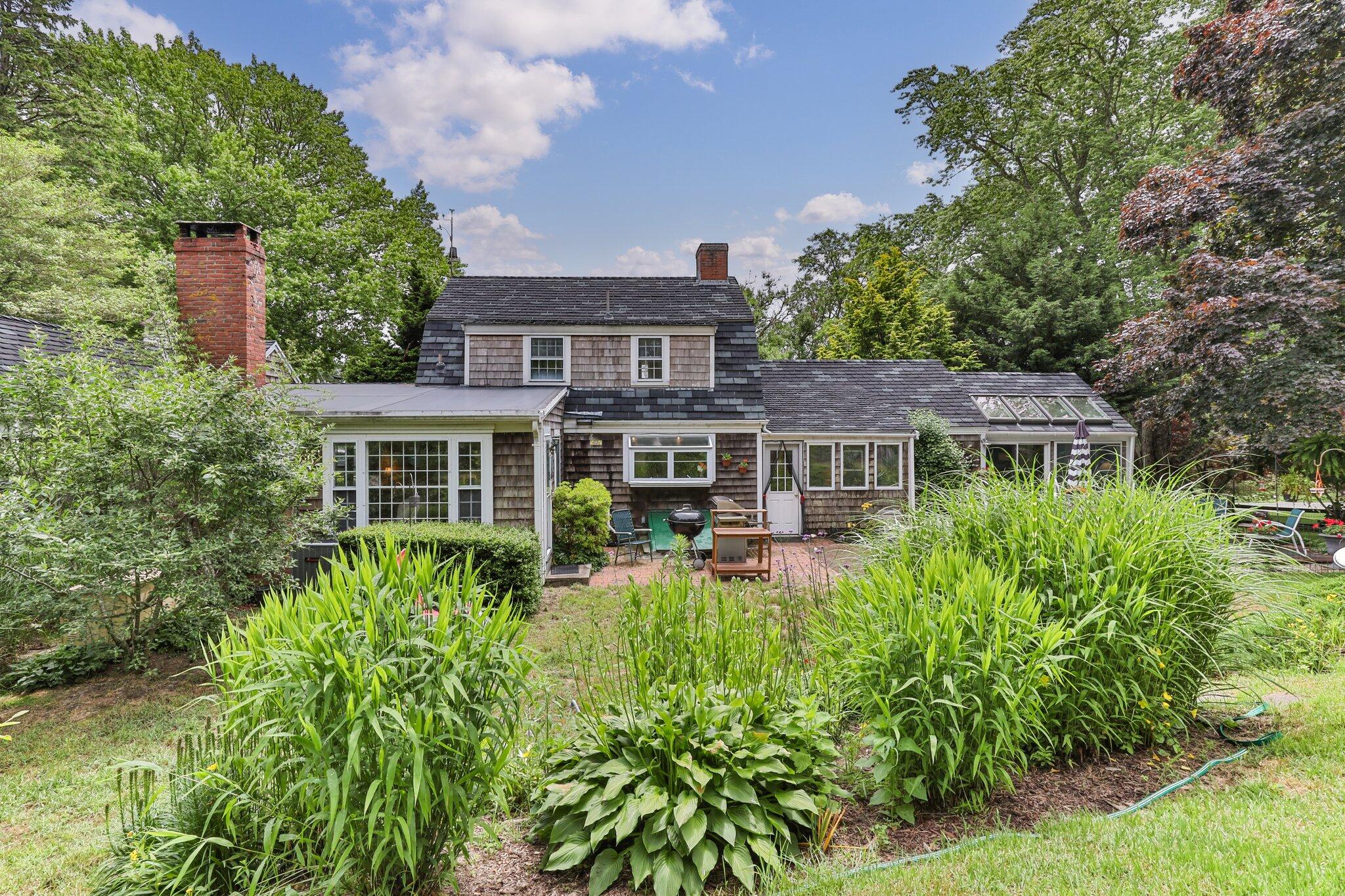 152 Monument Road Orleans, MA 02653 - Photo 36 of 40 a front view of a house with a yard