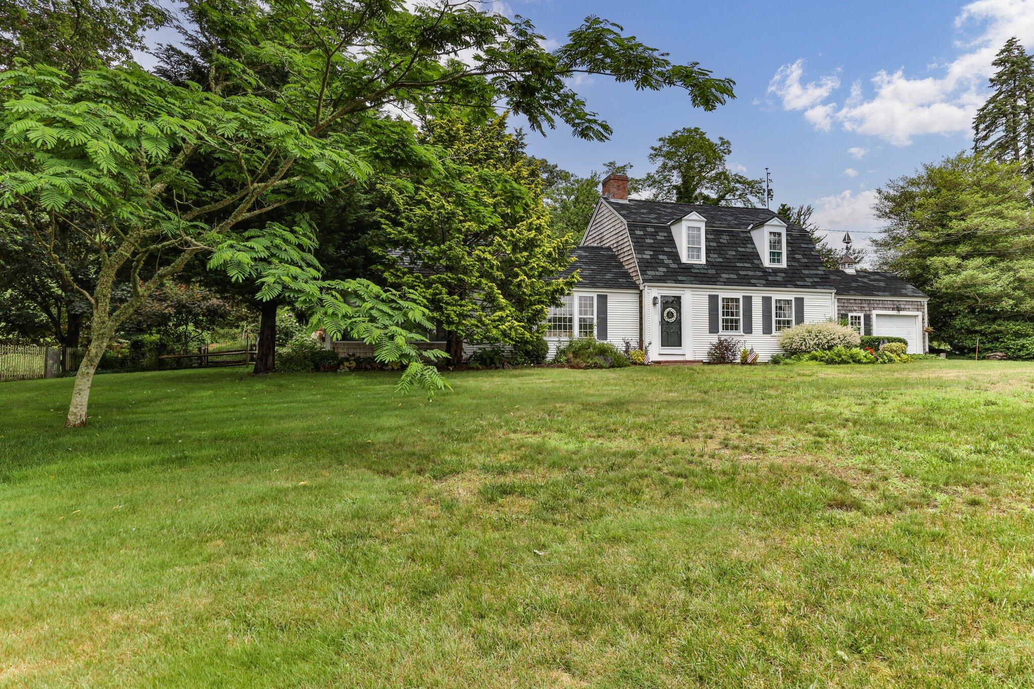 152 Monument Road Orleans, MA 02653 - Photo 38 of 40 a view of a house with a big yard