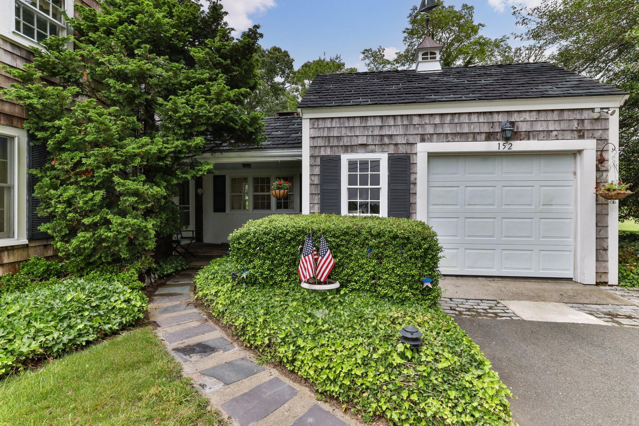 152 Monument Road Orleans, MA 02653 - Photo 6 of 40 front view of a house with a yard
