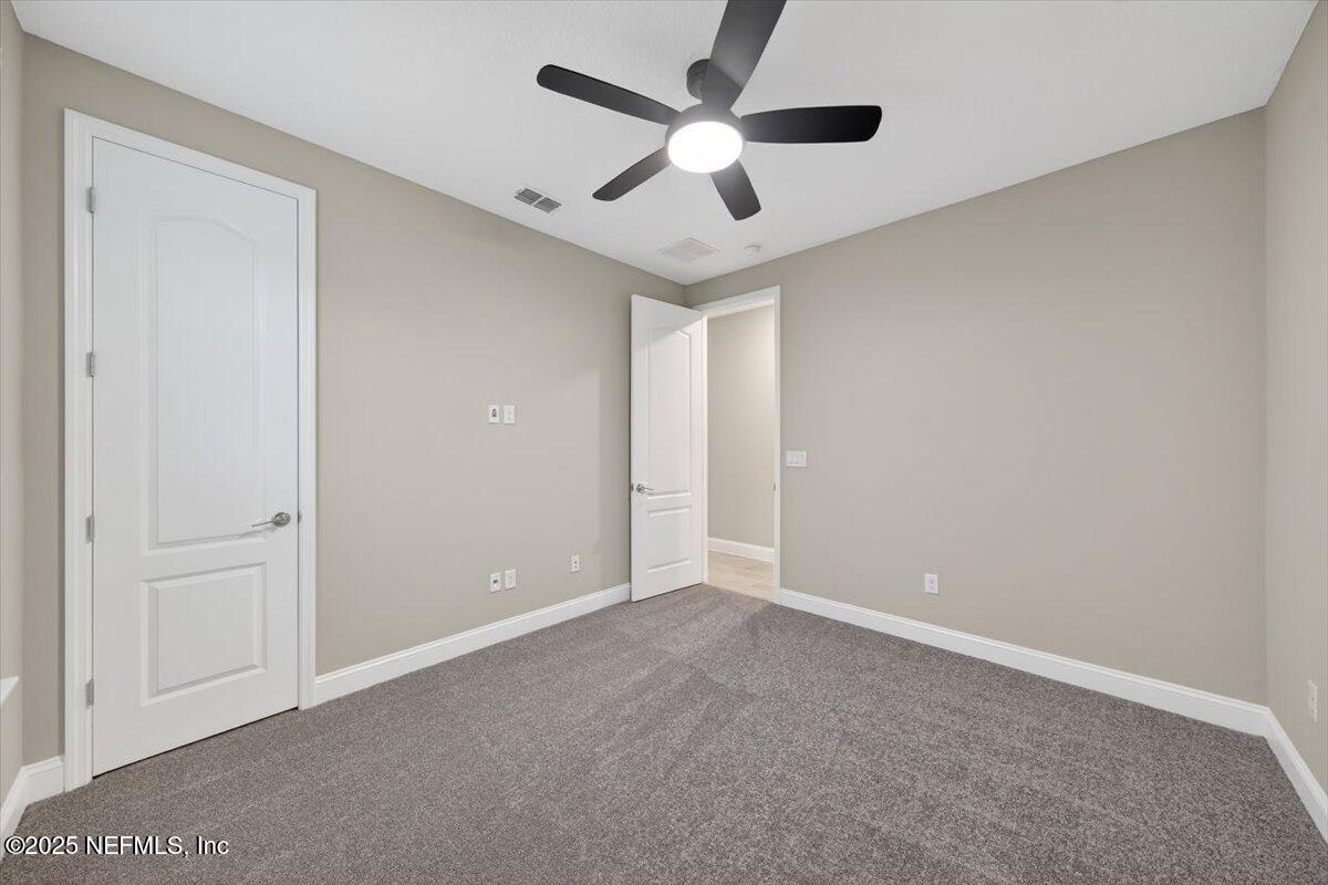 178 Antolin Way St. Augustine, FL 32095 - Photo 25 of 107 an empty room with ceiling fan