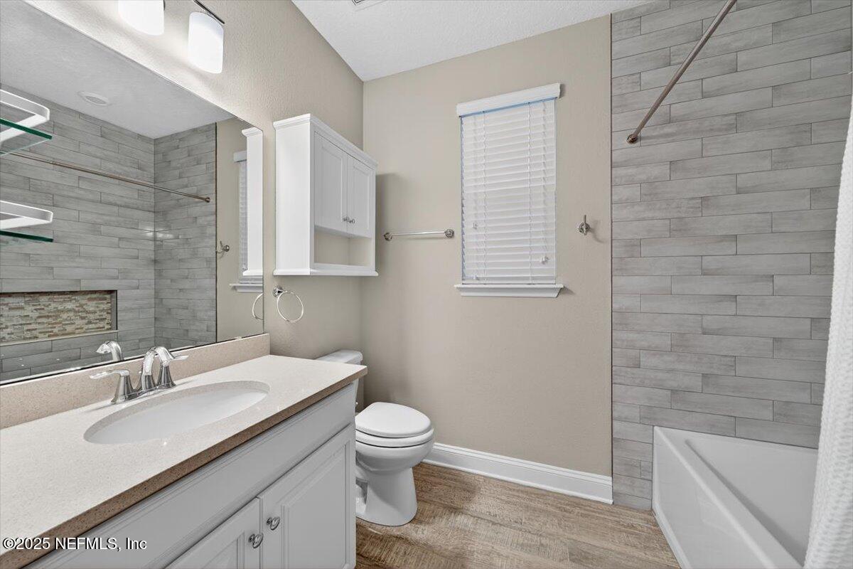 178 Antolin Way St. Augustine, FL 32095 - Photo 49 of 107 a bathroom with a sink and a mirror