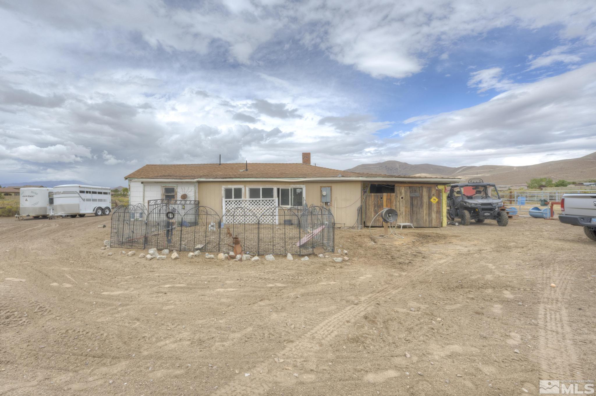 8250 Desert Way Reno, NV 89521 - Photo 3 of 32 a view of house with yard and sitting area