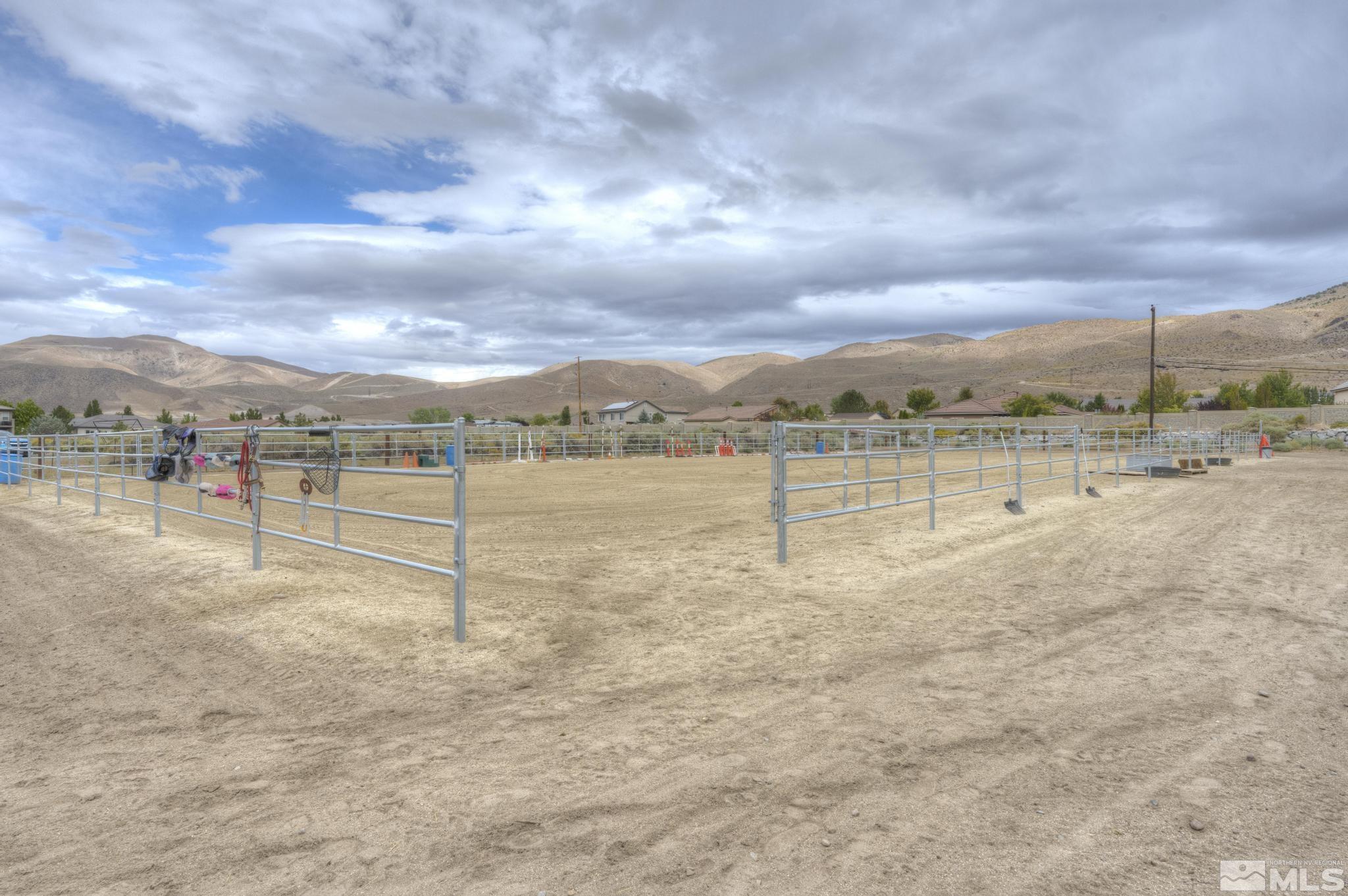 8250 Desert Way Reno, NV 89521 - Photo 9 of 32 a view of a lake with houses in the back