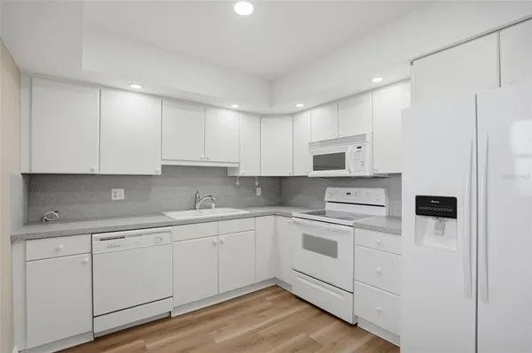 $315,000 | 5108 Brittany Drive South, Unit 1006, St. Petersburg, FL 33715