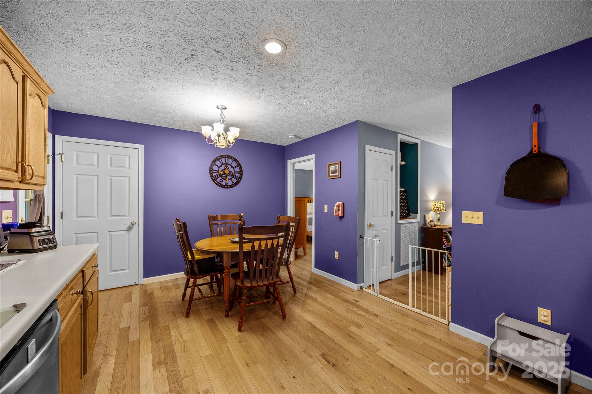 72 Sovereign Circle Clyde, NC 28721 - Photo 11 of 21 a view of a dining room with furniture and chandelier