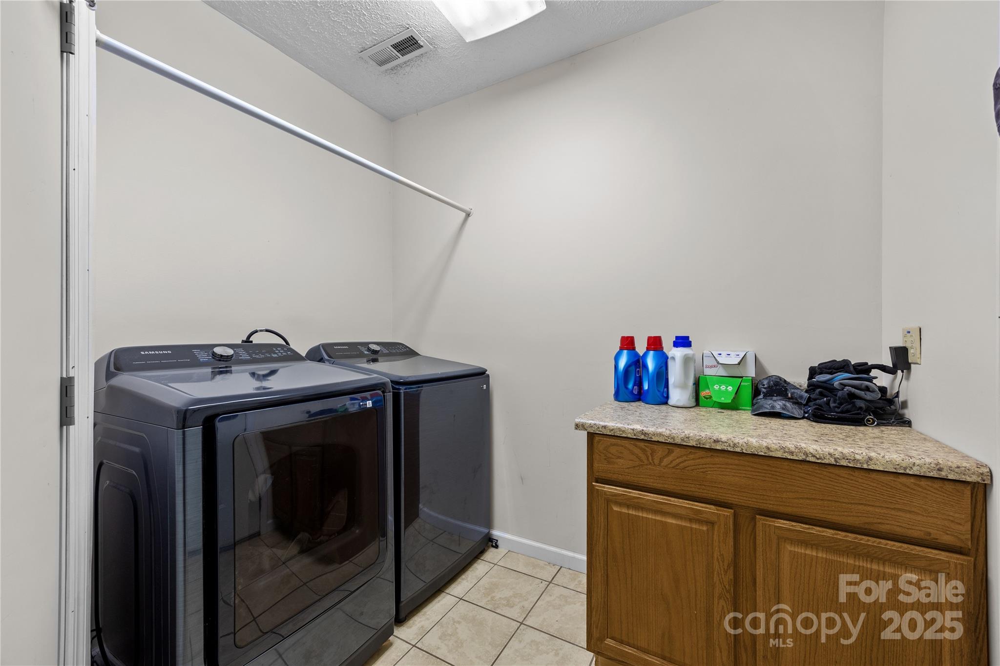 72 Sovereign Circle Clyde, NC 28721 - Photo 20 of 21 a utility room with sink dryer and washer