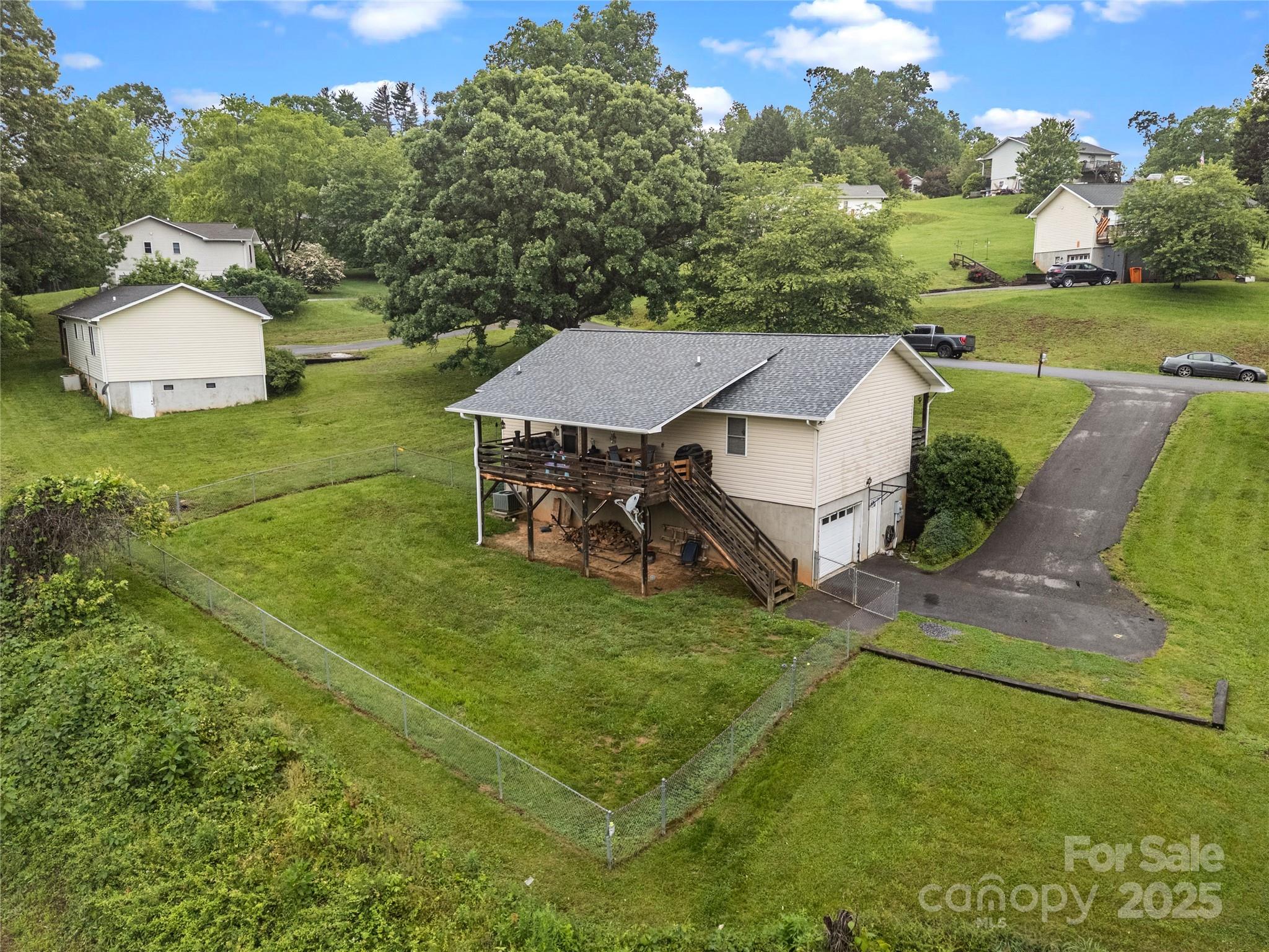 72 Sovereign Circle Clyde, NC 28721 - Photo 4 of 21 an aerial view of a house having yard