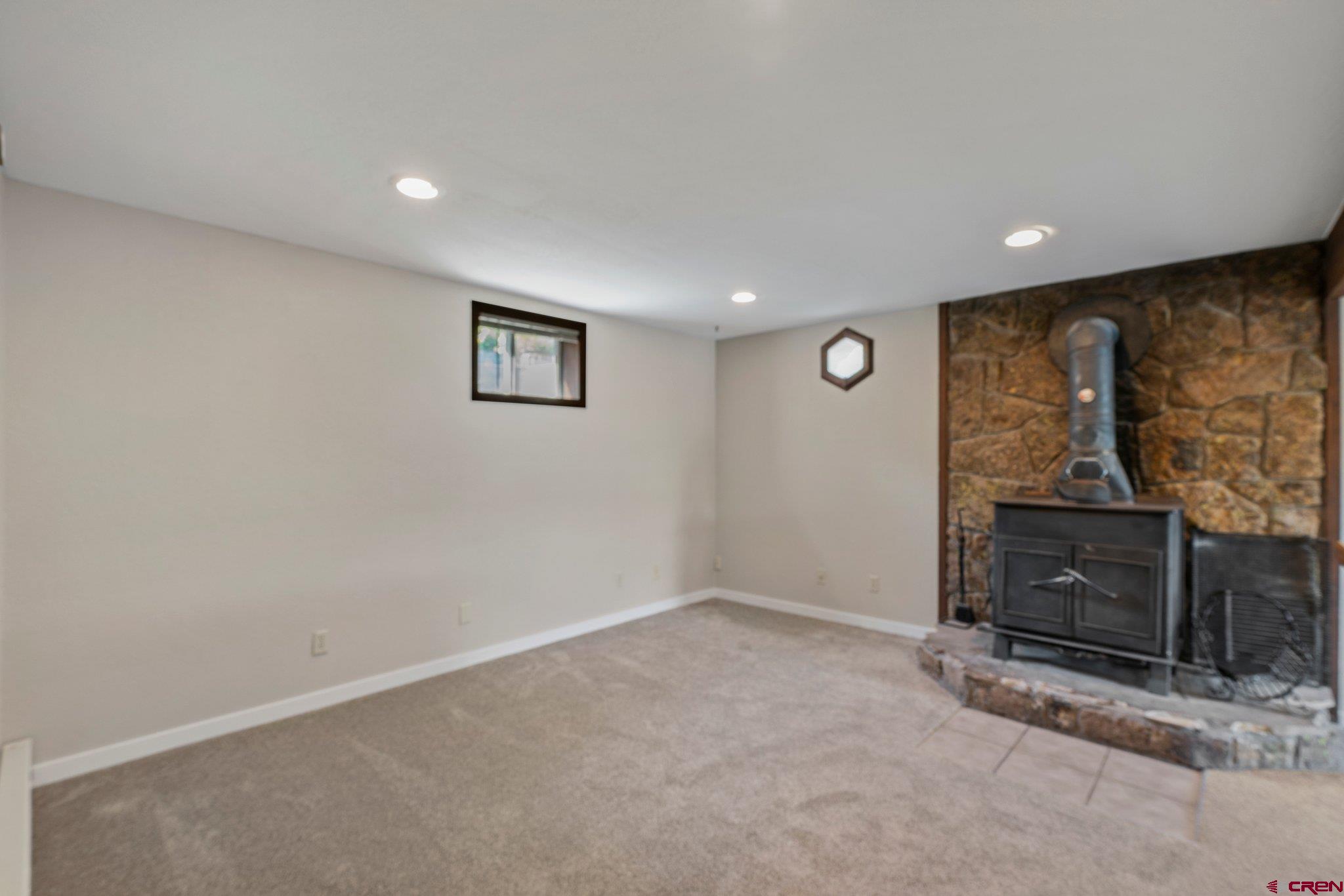 2913 Richard Drive Durango, CO 81301 - Photo 23 of 35 a view of an empty room with a fireplace