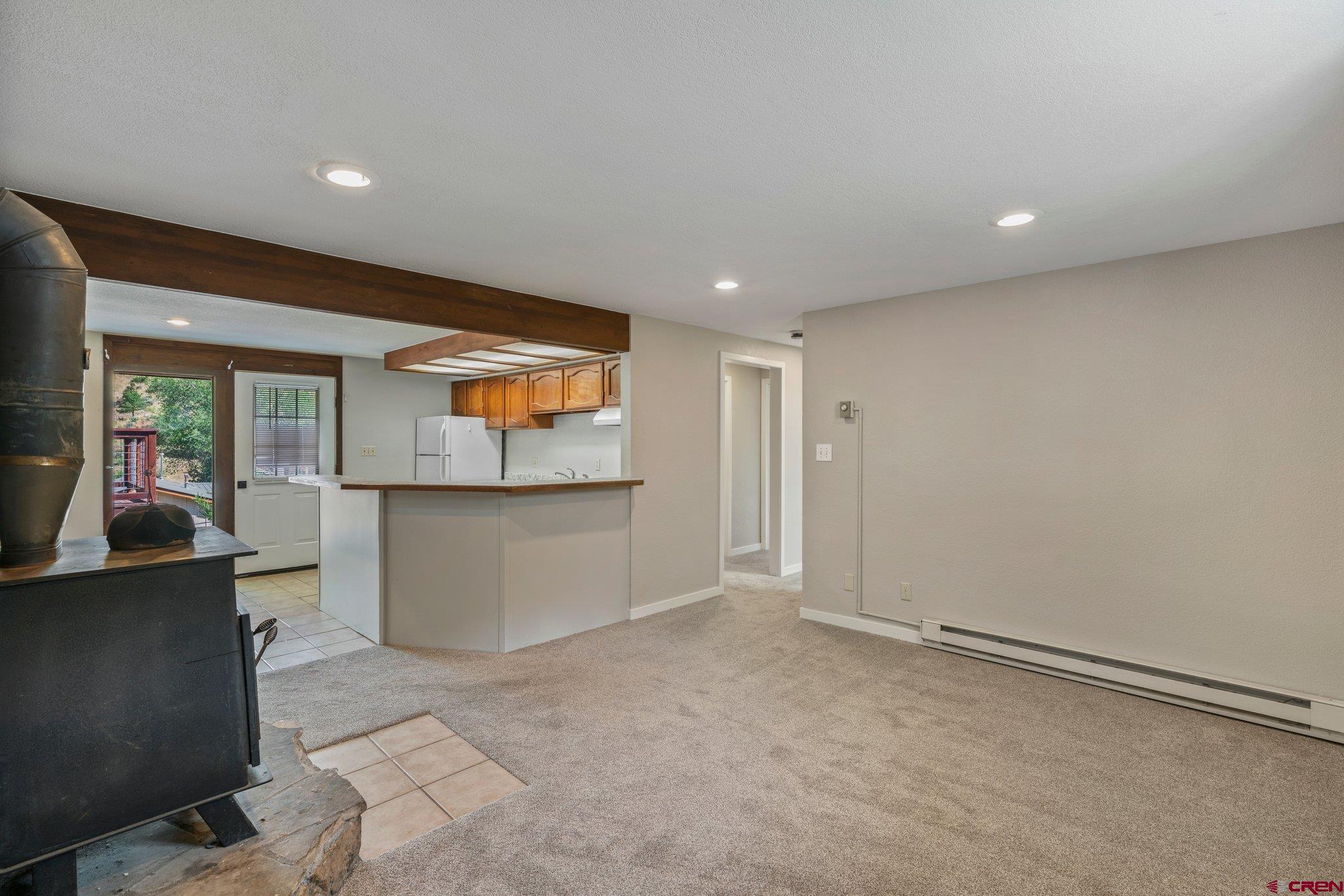 2913 Richard Drive Durango, CO 81301 - Photo 24 of 35 a view of a room with wooden floor and windows