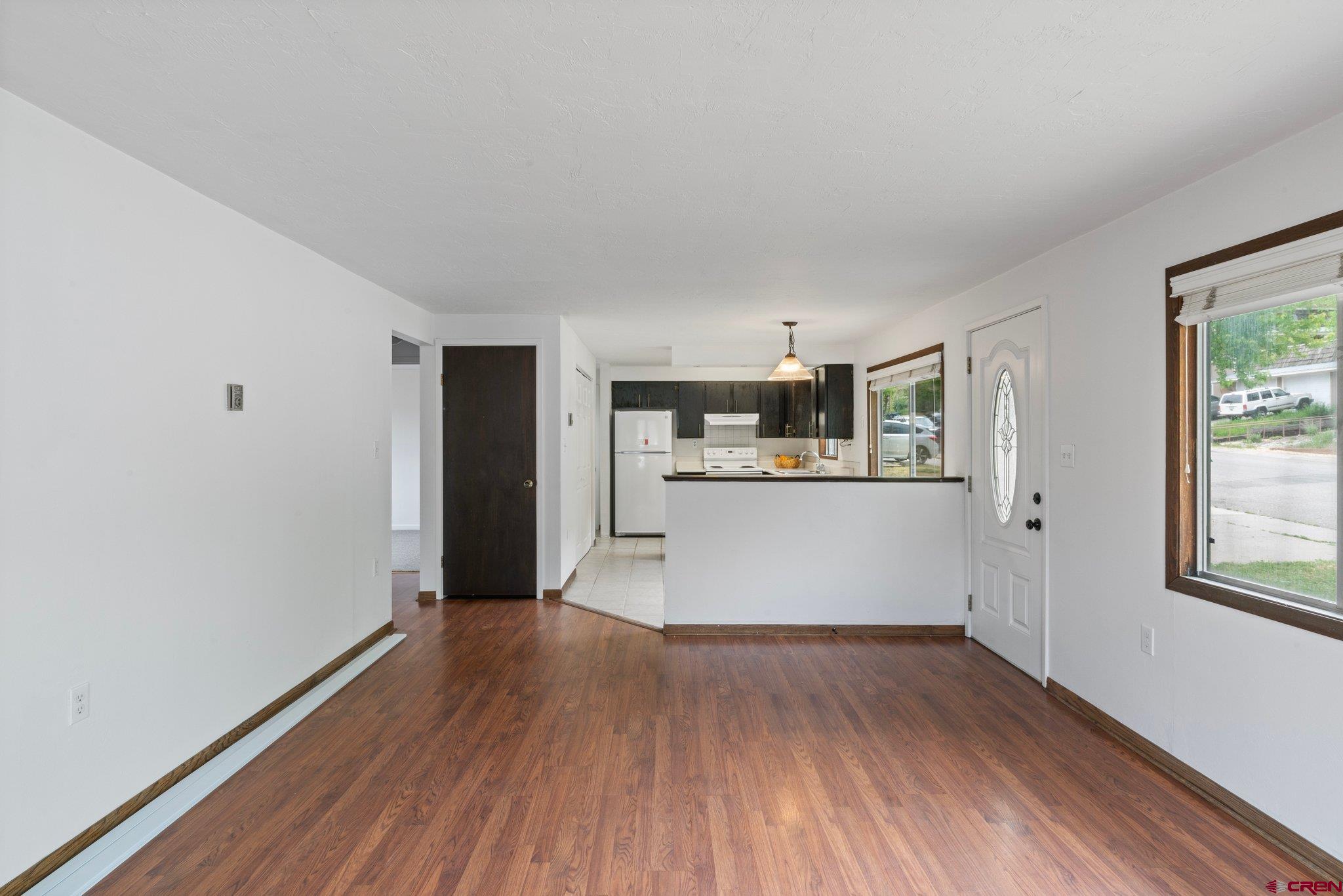 2913 Richard Drive Durango, CO 81301 - Photo 10 of 35 a view of a kitchen with wooden floor and electronic appliances