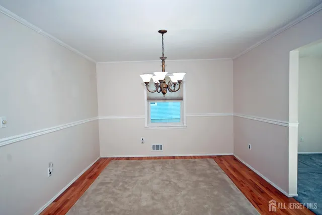 a bathroom with a granite countertop shower sink and mirror