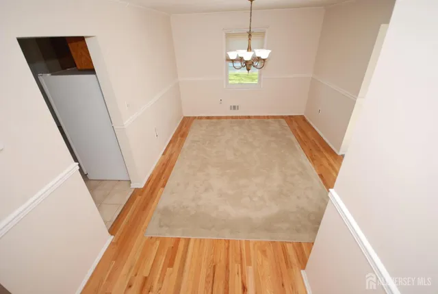 a kitchen with a stove and a microwave