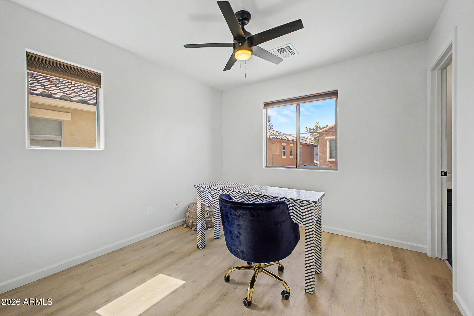 451 South Hawes Road, Unit 27 Mesa, AZ 85208 - Photo 22 of 27 a room with furniture and a window