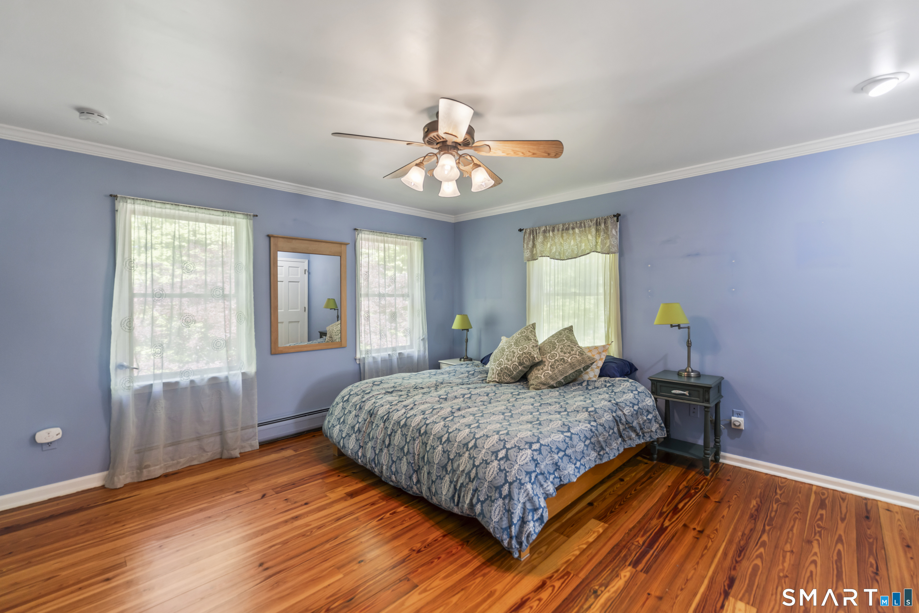 18 Gelding Hill Road Newtown, CT 06482 - Photo 25 of 40 a bedroom with a bed and wooden floor