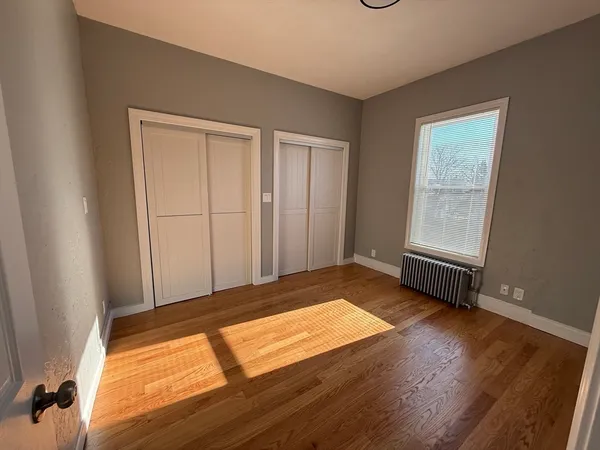 a view of an empty room and window