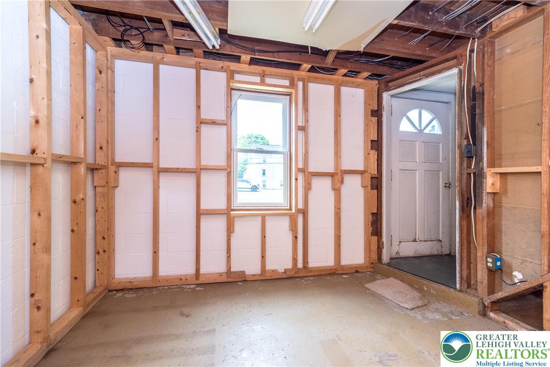 1815 Leithsville Road Hellertown, PA 18055 - Photo 23 of 38 Ready for your vision, this unfinished basement provides a versatile space for future expansion.