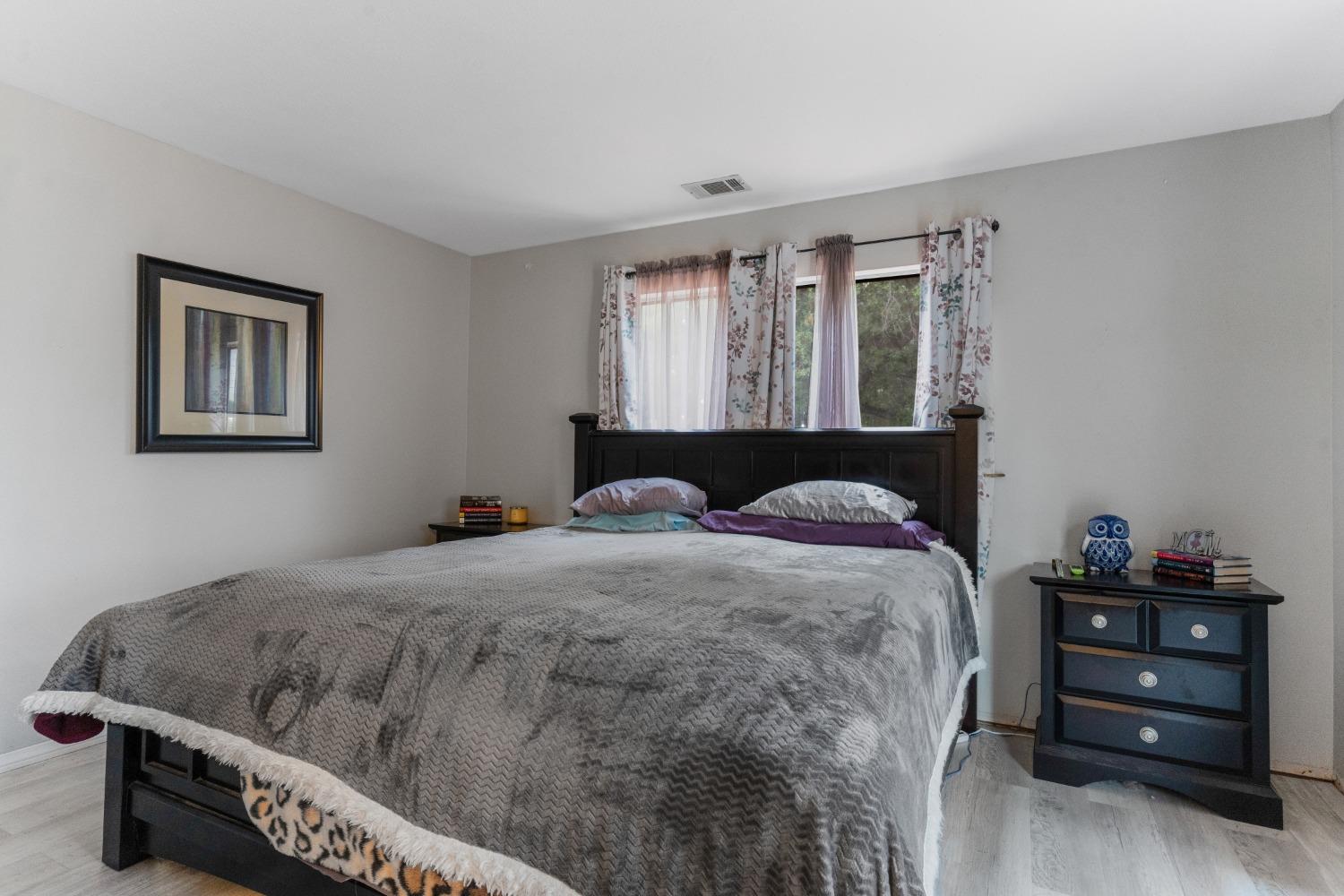 232 Prospect Street Oak View, CA 93022 - Photo 12 of 33 a bedroom with a bed and a window