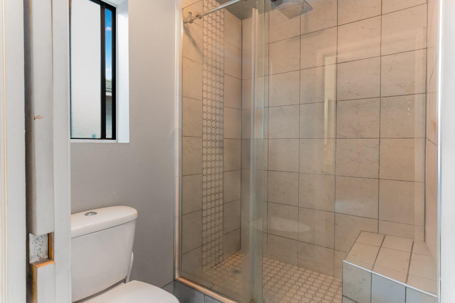 232 Prospect Street Oak View, CA 93022 - Photo 15 of 33 a bathroom with a toilet and shower