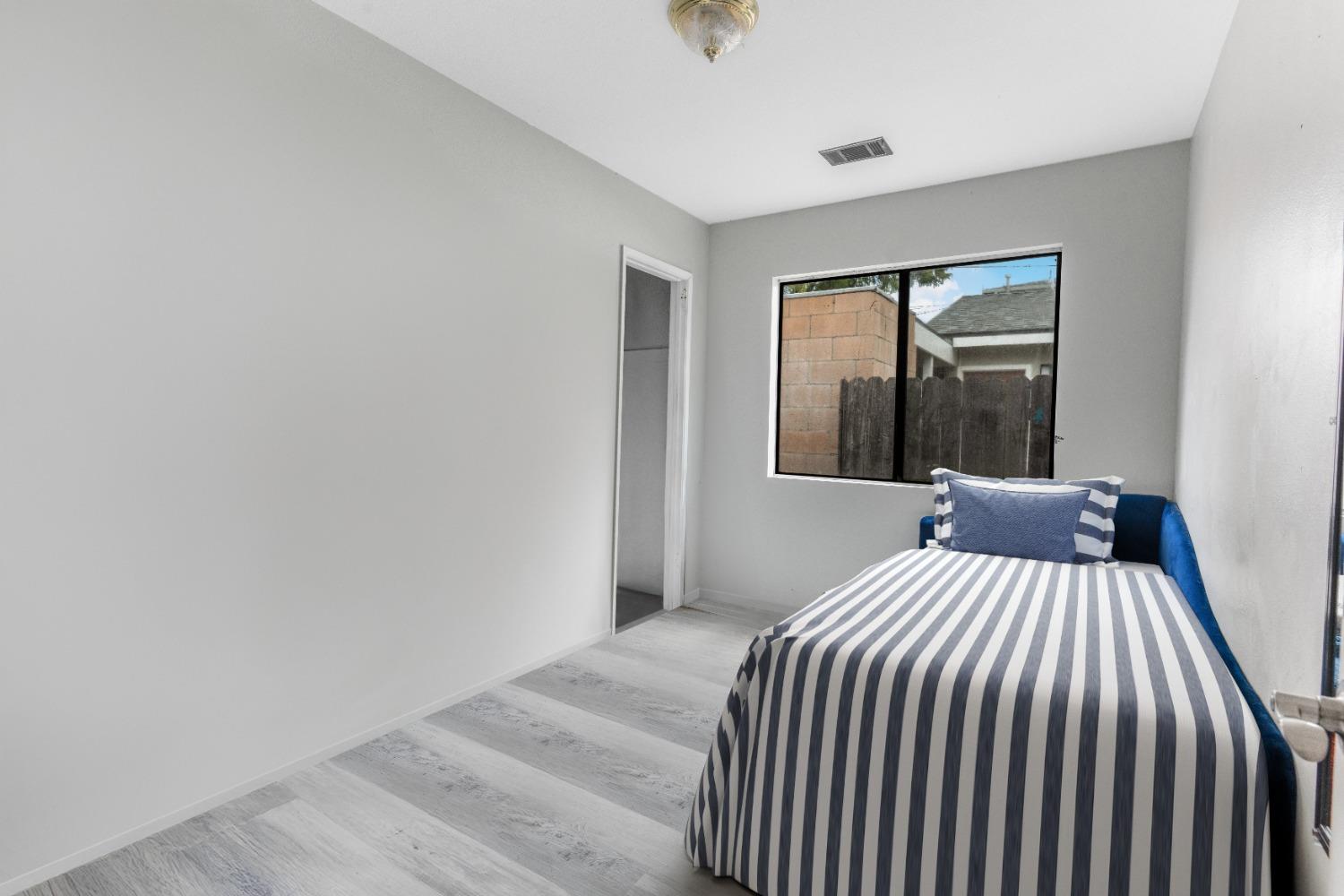 232 Prospect Street Oak View, CA 93022 - Photo 16 of 33 a bedroom with a bed and a window