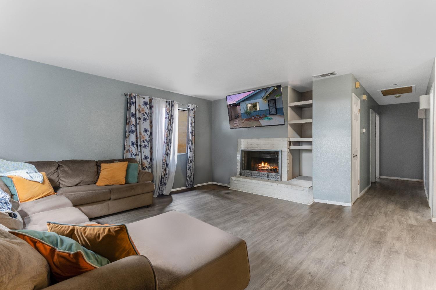 232 Prospect Street Oak View, CA 93022 - Photo 4 of 33 a living room with furniture and a fireplace