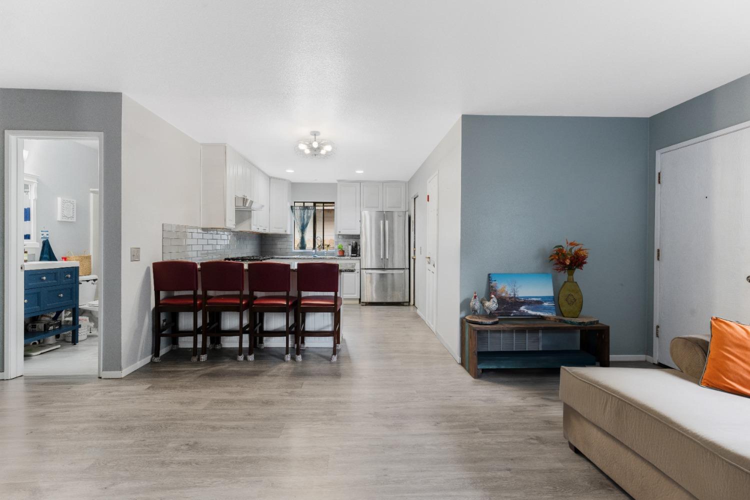 232 Prospect Street Oak View, CA 93022 - Photo 7 of 33 a living room with furniture and a dining table