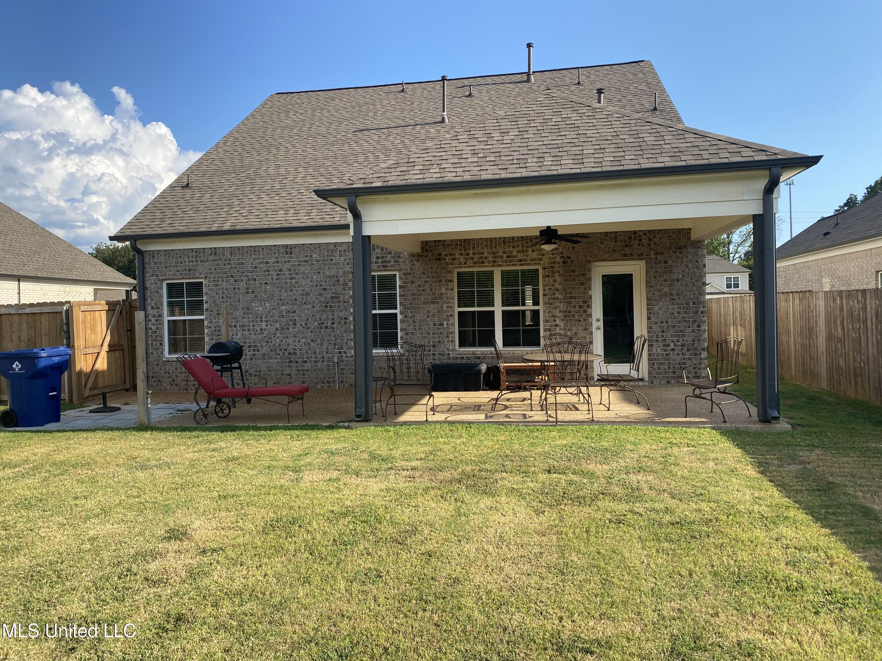 7414 Crosswinds Boulevard Hernando, MS 38632 - Photo 27 of 28 covered patio with fan and extra patio a