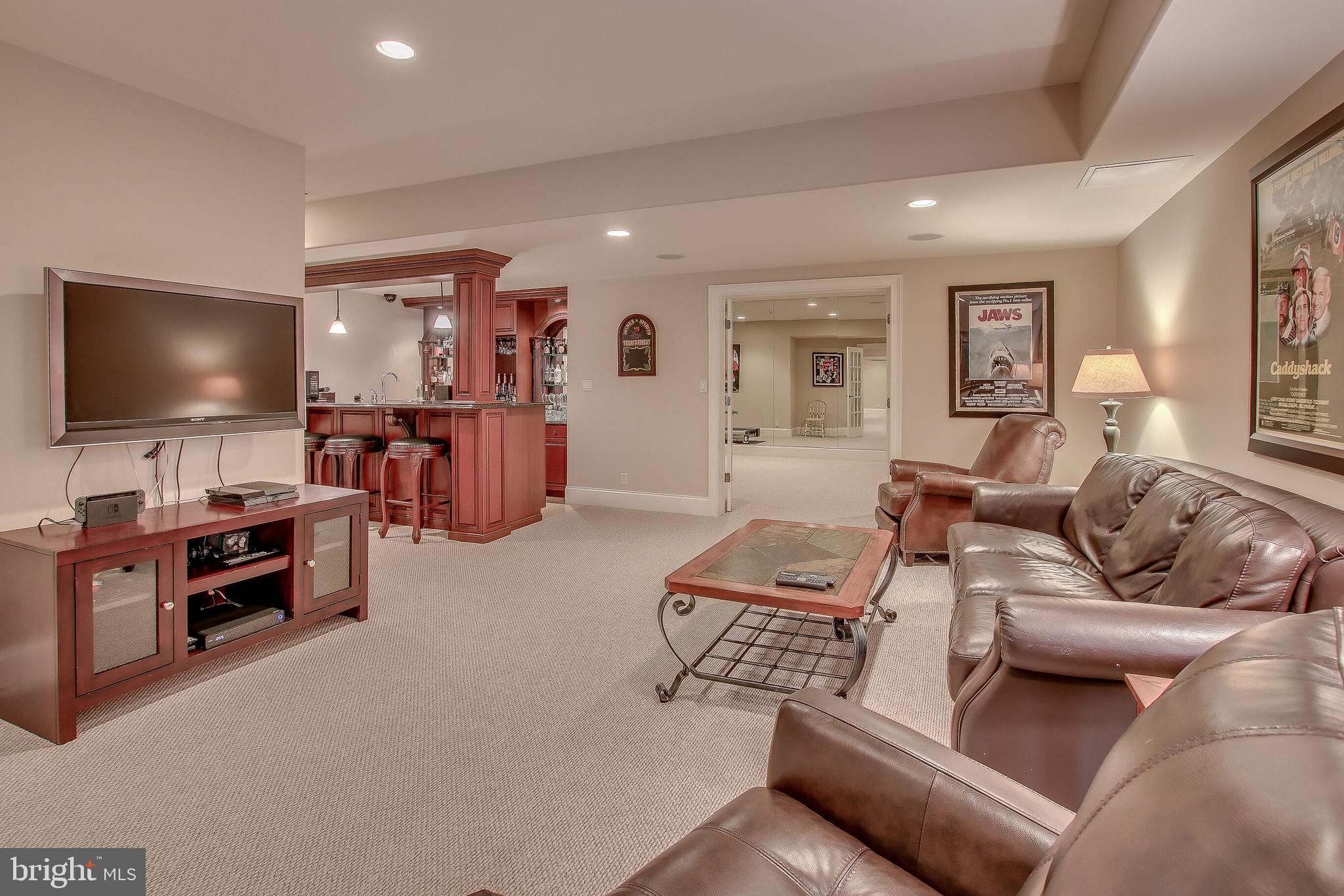 1063 Walton Road Blue Bell, PA 19422 - Photo 25 of 54 Sitting Room with Full Bar in Lower Level