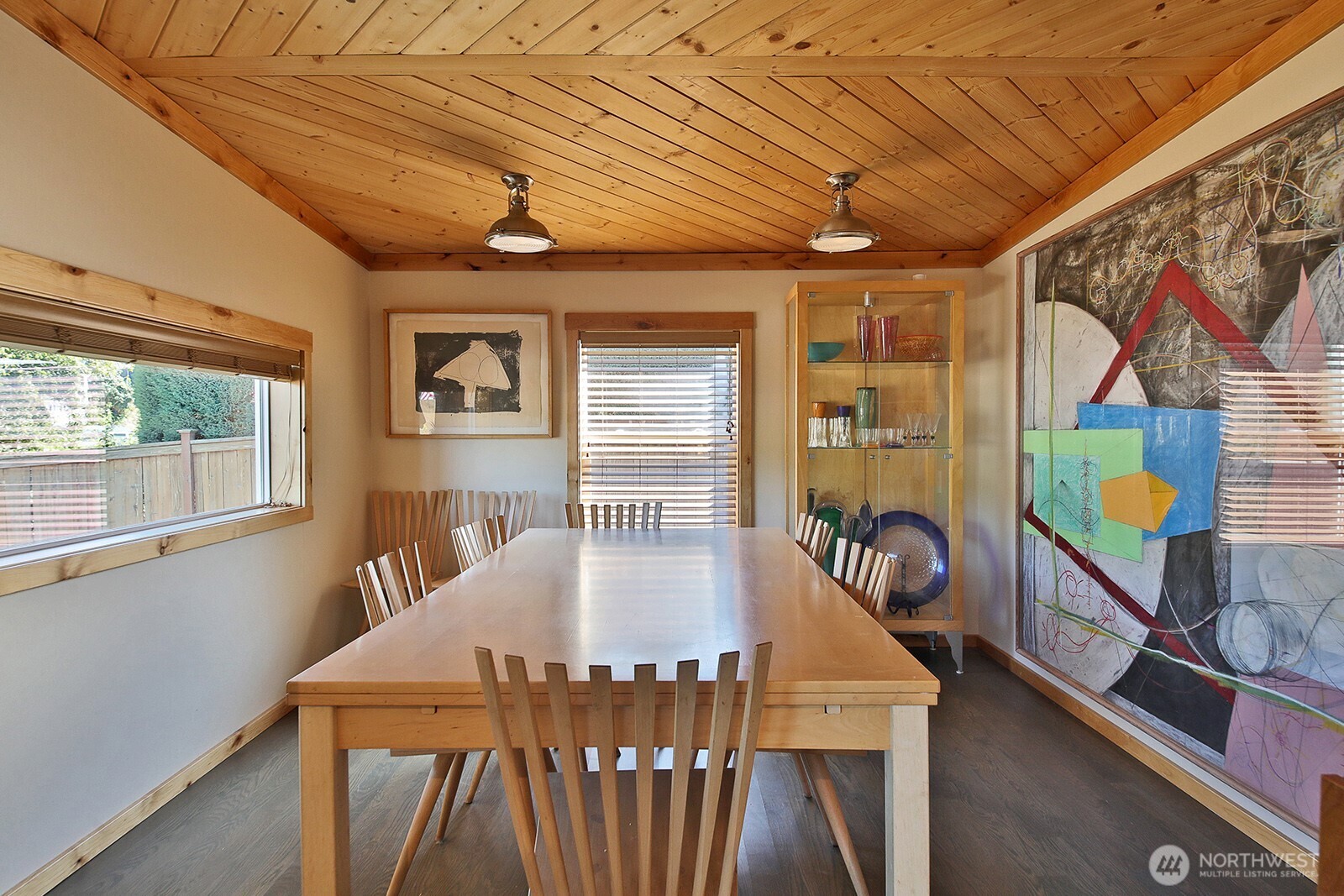 8121 Sandy Hook Terrace Clinton, WA 98236 - Photo 14 of 40 a dining room with furniture and a window