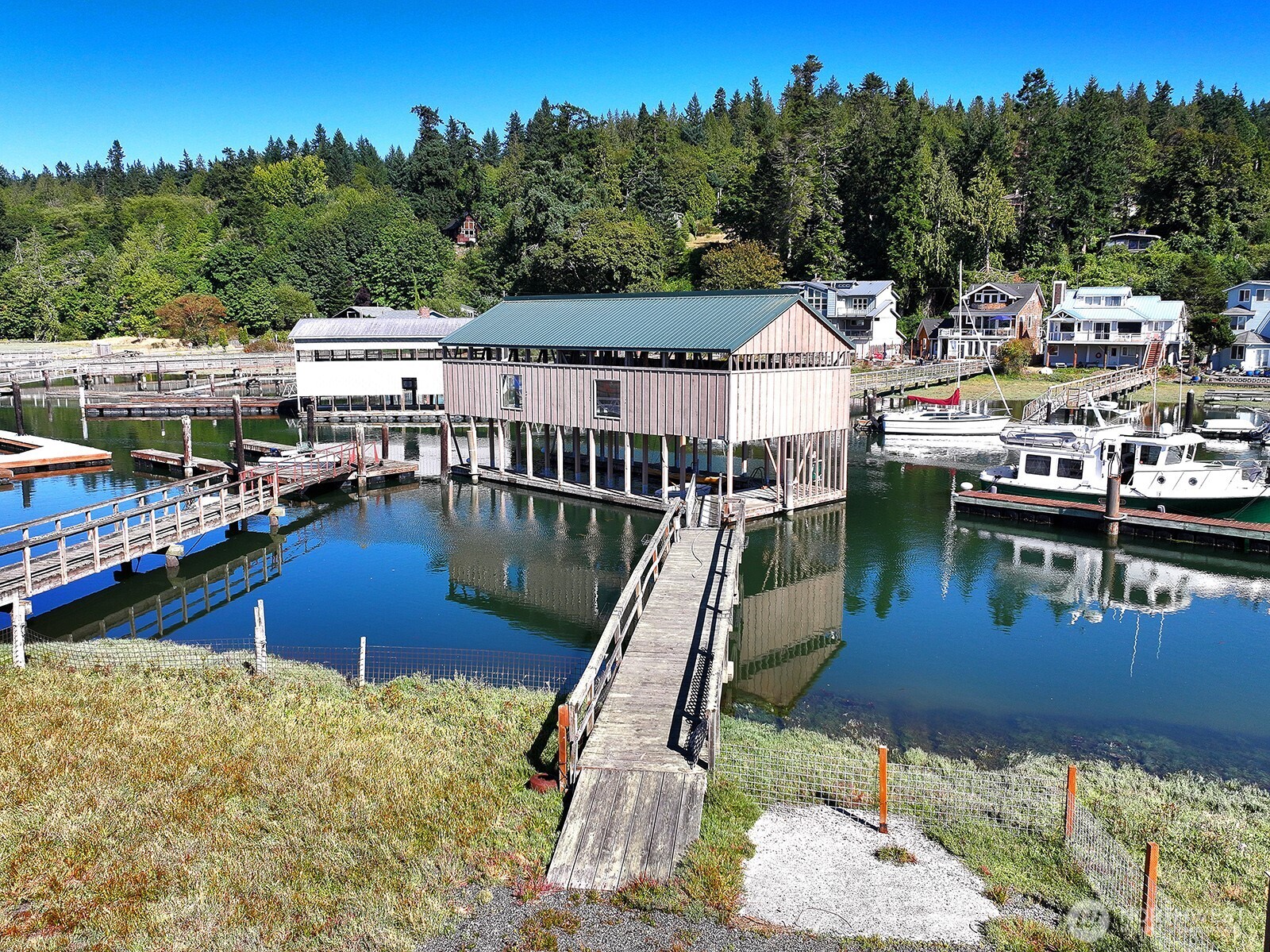 8121 Sandy Hook Terrace Clinton, WA 98236 - Photo 30 of 40 a swimming pool view with a lake view